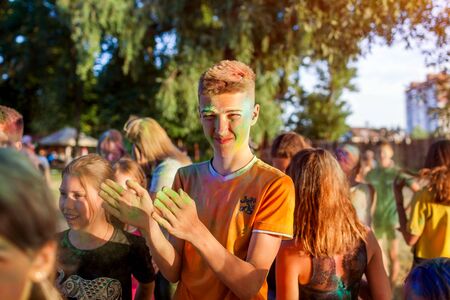 Myrhorod, Ukraine - June 16, 2019: Group of a young people throwing paints on indian Holi festival of colorsのeditorial素材