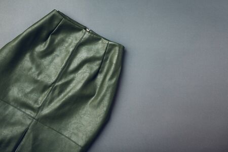 Trendy leather skirt on greyの写真素材