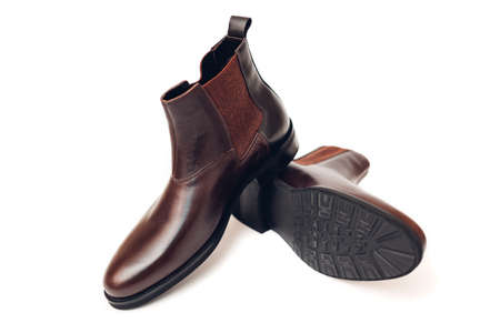 Shoes, chelsea leather boots for men. Male winter, autumn or spring fashion. Stylish brown footwear isolated on white background.の写真素材