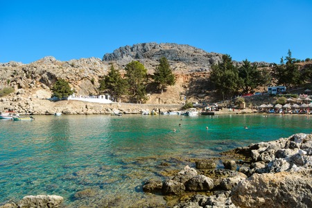 A beautiful view from St Pauls Bay Beach in Lindos on summer days, Rhodes, Greeceの写真素材