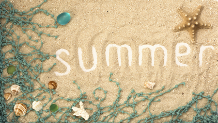 Summer white letters with seashells and details on sandy background. Summer flatlayの写真素材