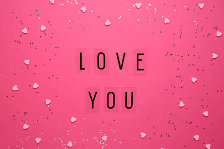 Text frame with the inscription love you. Valentines, womens, mothers day, love concept. 8 march. Top view.の写真素材