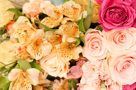 Beautiful floral flat lay, fresh flowers background. Spring, summer concept. Top viewの写真素材