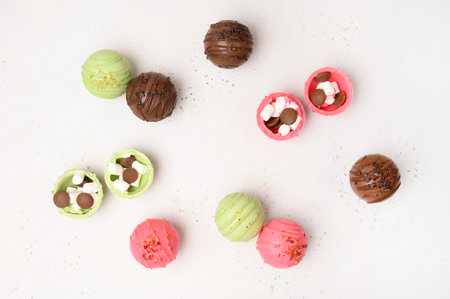Cocoa bombs with marshmallows, chocolate that melts when hot milk is added for creating a trendy tasty drinkの写真素材