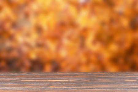 Wooden podium and autumn background empty space for presentation your productの写真素材