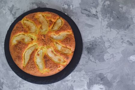 Homemade pear pie on a grey tableの写真素材