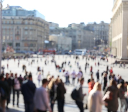 Blurred crowd of turists on big historical square in city center of Moscow. Spring warm timeの写真素材