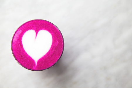 Beetroot super latte on marble background with love symbolの写真素材