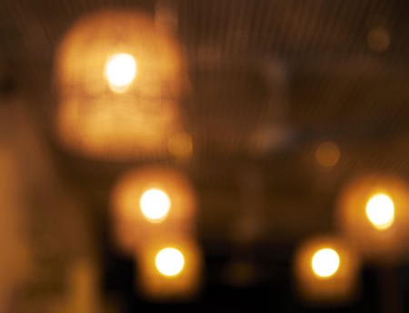 Blurred background: Restaurant with tables and chairs blur background.の写真素材