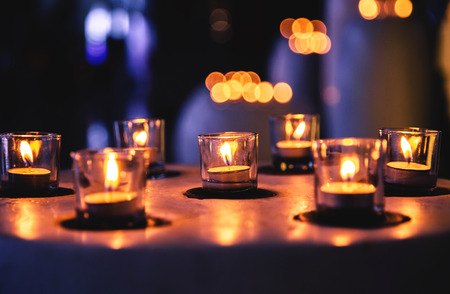 Some candles in a row in spa zone for relaxing time. It is late night.の写真素材
