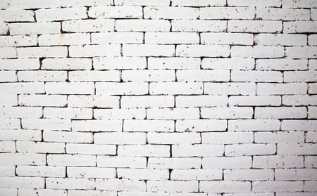 White brick wall can be used as perfect backgroundの写真素材