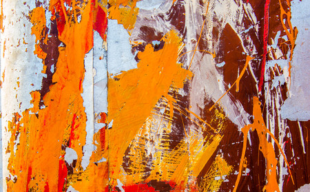 Surface of rusty iron backgrond. It is old painted colorful texure with yellow, orange and red paint.の写真素材