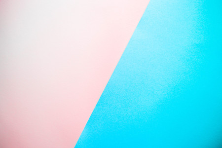 Colorful of light pink and blue paper background. Trendy colors. Can be used for textの写真素材