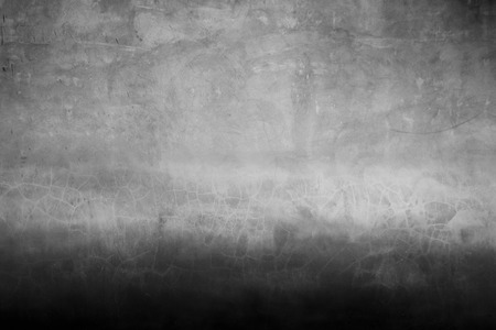 Old wall surface in two tone color with black and grey.の写真素材