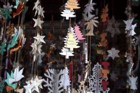Christmas decoratioon with wooden trees on street market.の写真素材