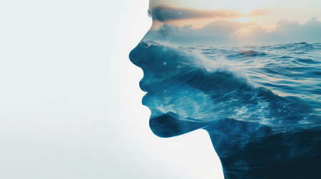 tranquil double exposure combining a woman's profile with a peaceful ocean sceneの素材