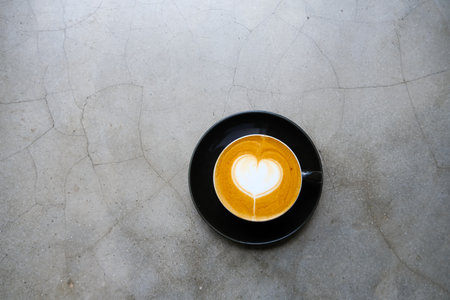 Heart Shape Latte Art on Concrete Backgroundの写真素材