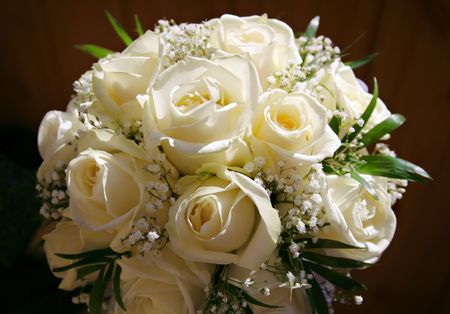 beige wedding bouquet on a dark backgroundの写真素材