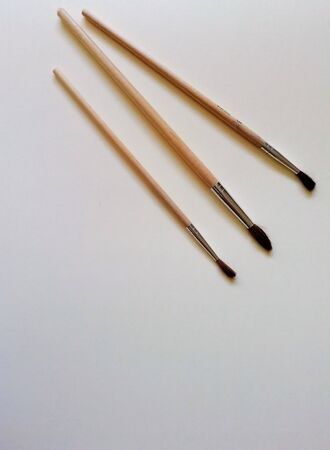 Brush on the white background with a place for text. Chancery on the desk.の写真素材