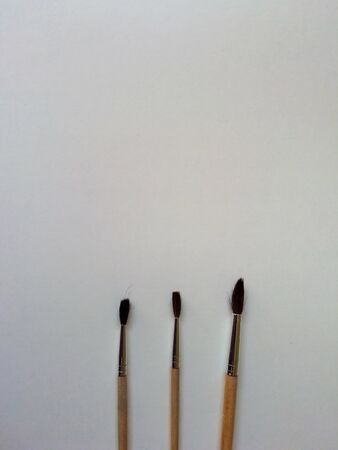 Brush on the white background with a place for text. Chancery on the desk.の写真素材