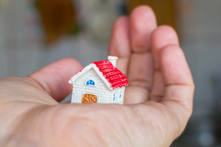figure of the house in hand. Conceptの写真素材