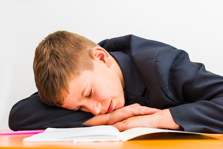 boy fell asleep during homework lessonの写真素材