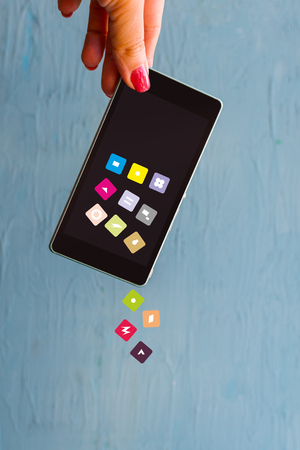 concept of data storage in the phone. falling out apps from your phone