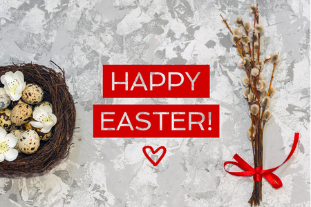 quail eggs in the nest and willow branch. happy Easter conceptの写真素材