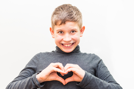 portrait of a teenage boy with a silly expressionの写真素材