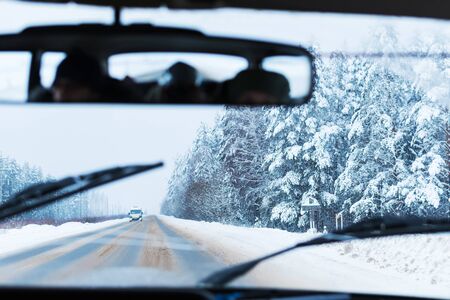 view from the car window on the snow-covered track