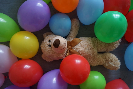 Teddy bear in balloonsの写真素材