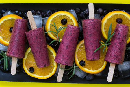 Blueberry yogurt ice cream pops. Summer refreshment. Homemade healthy dessert. Recipe ideas. Close upの写真素材