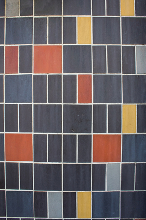 Colorful ceramic tiles background. Geometric pattern. Exterior design.