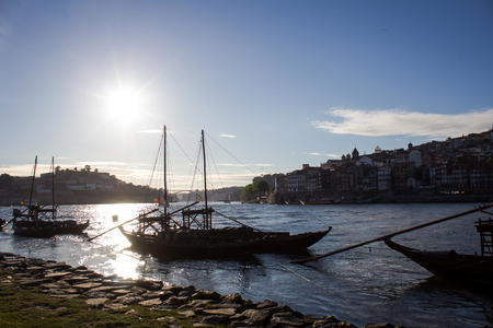 Old Porto and traditional boats with wine barrels, Portugal. Travel and vacation concept.の写真素材