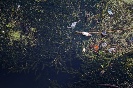Polluted river with various garbage. Warning concept.の写真素材