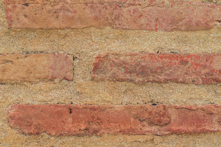 Exposed brick exterior wall. Backgroundの写真素材