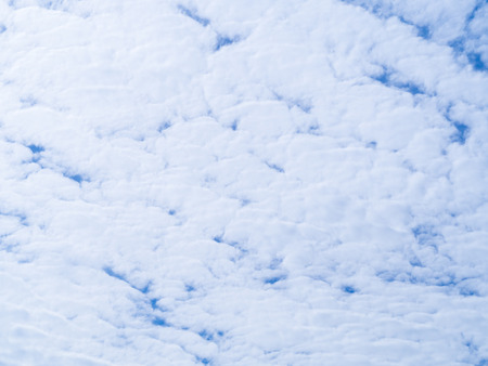 Blue sky with white cloud background.の写真素材