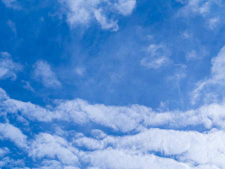 Blue sky with white cloud background.の写真素材