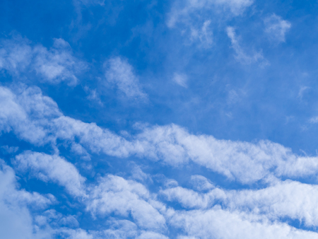 Blue sky with white cloud background.の写真素材