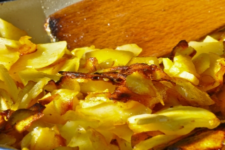 Healthy cuisine and nutritious dish of baked potatoes with a dash of olive oil and sprinkle of spices の写真素材