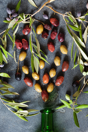 Concept of virgin olive oil with fresh berriesの写真素材