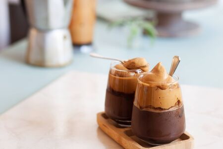 Two glasses with whipped iced coffee dalgona, korean summer refreshing drinkの写真素材