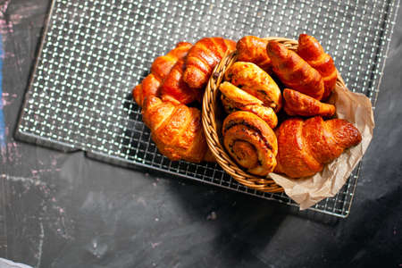 Assortment of fresh baked puff pasrty, low key top viewの写真素材