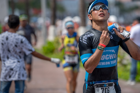 Runner is feeling good after refreshing himselfのeditorial素材