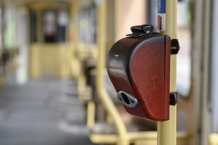 Vintage ticket punching validating machine on a tram in Budapest Hungaryの写真素材