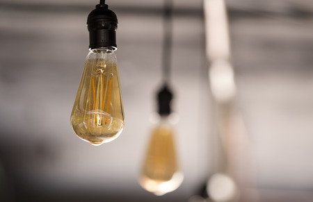 Energy saving vintage LED bulbs hangingの写真素材
