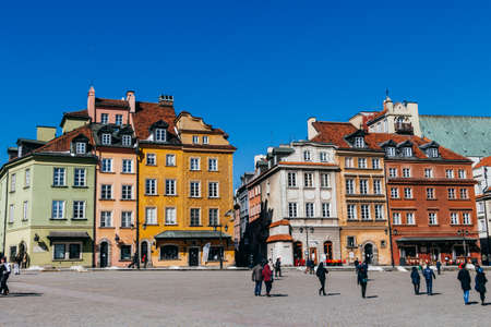 Warsaw, Poland - March 18, 2020: Buildings on Castle Square, a historic square in front of the Royal Castle, Warsaw. High quality photoのeditorial素材