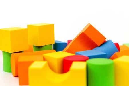 Bright multi-colored details of the designer. Children's toy on a white background. Background of colorful toy figures.の写真素材