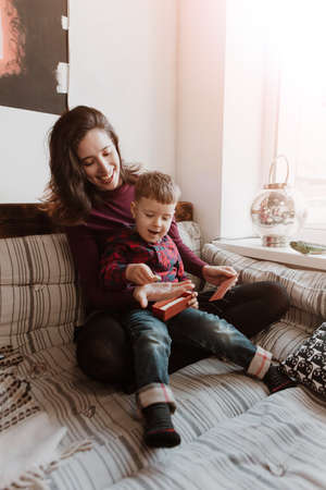 Mother and son play in the room. Mother's day. The concept of familyの写真素材