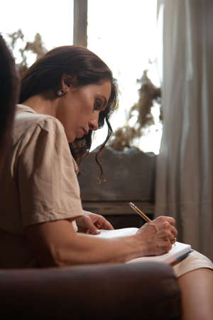 The process of writing tasks for the day. Effective time management